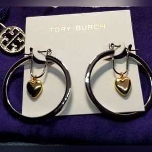 Silver and gold hoops by Tory Burch